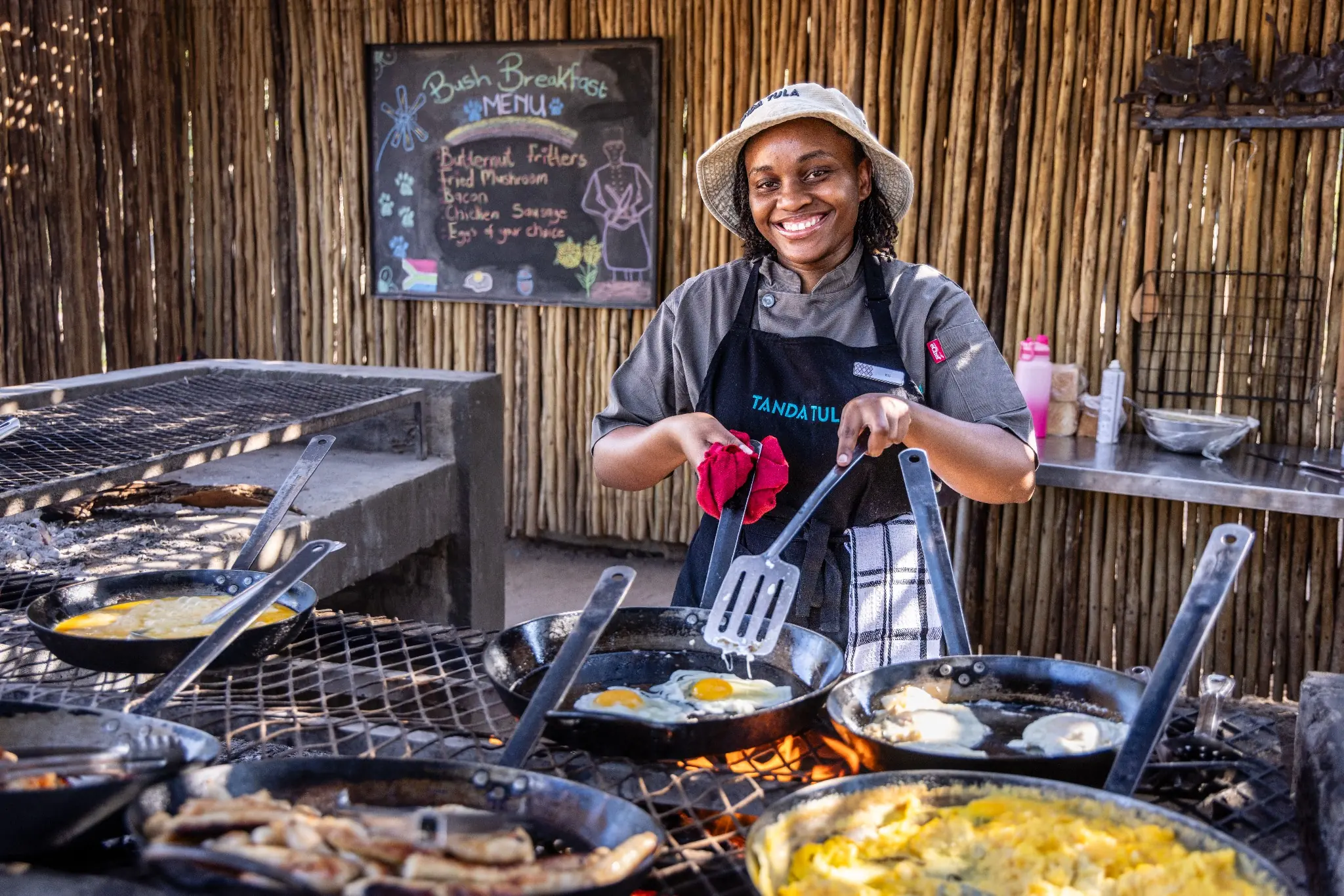 Tanda Tula chef preparing a bush breakfast over an open fire